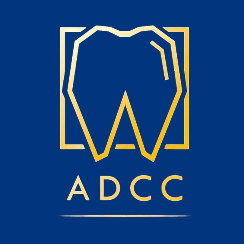 Alaradi Dental & Cosmetic Center logo: a gold tooth inside a square frame above the letters ADCC